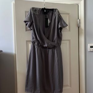 Beautiful silky lined cocktail dress, new with tags.